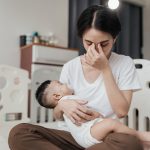 Tired,Asian,Mother,Suffering,From,Experiencing,Postnatal,Depression.,Healthcare,Single
